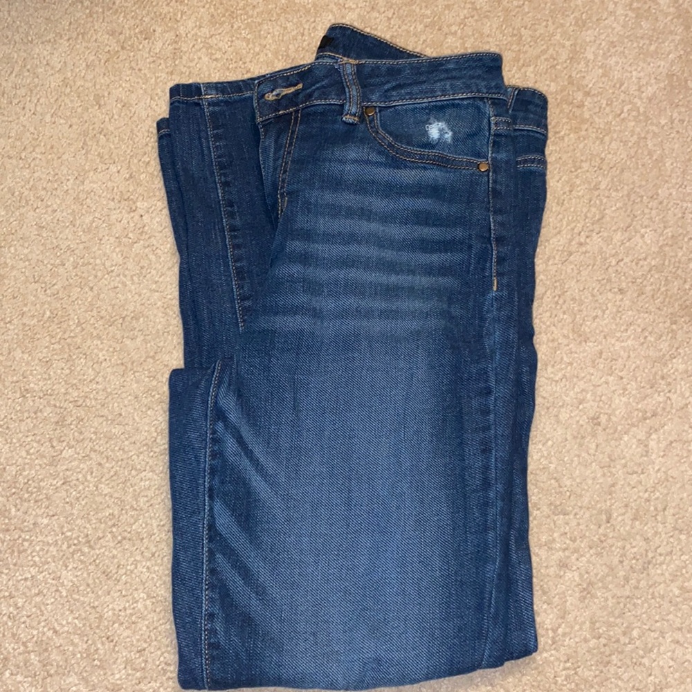 Brand new with out tags, dark jean with some rips.